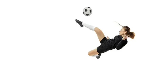 Attacking player. One sportive girl, female soccer player training with football ball isolated on white studio background. Sport, action, motion, fitness — Stock Photo, Image
