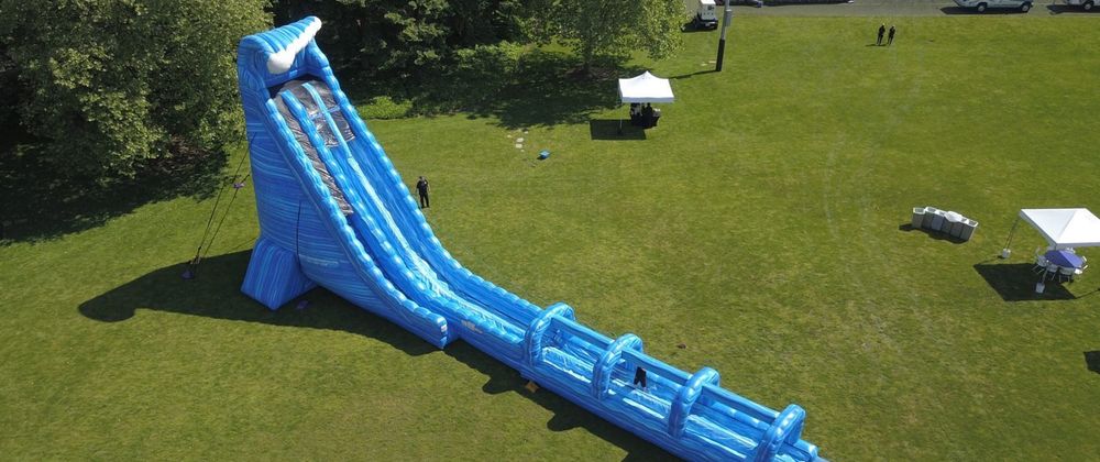 Cover image for Hosting a Memorable Event with Bounce House Water Slides for Rent and Bounce House Rentals